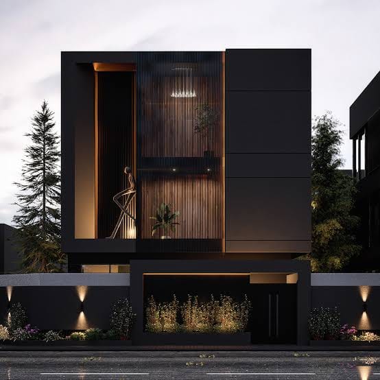 Modern architectural facade illuminated with controlled exterior lighting at night